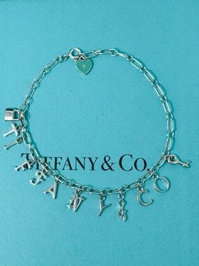 Authentic Tiffany & co. Enamel Blue Tag Heart  Note Logo Bracelet.
